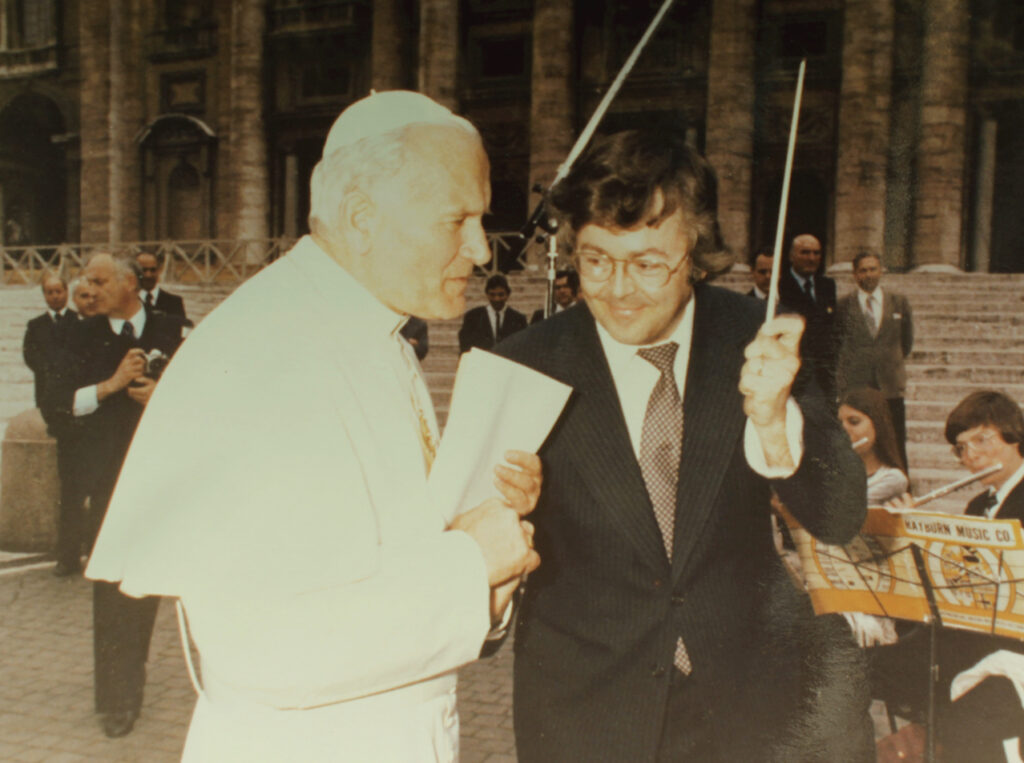 Pope John Paul 11 in April of 1981 listening to a special performance of The Pines of the Appian Way by the New England Conservatory's Massachusetts Youth Wind Ensemble by the steps of the Vatican, Rome Italy.